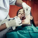 dentists-treat-patients-teeth-1